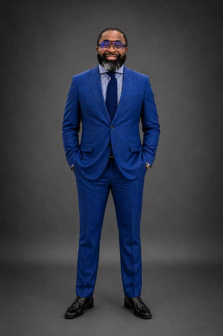 Olukayode Olusanya in a blue suit